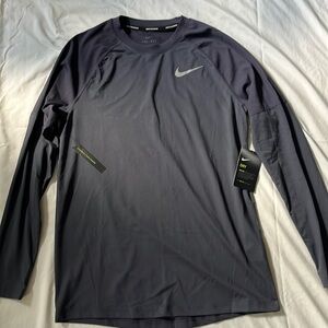 Nike dry fit running long sleeve gray men’s shirt. New with tags.